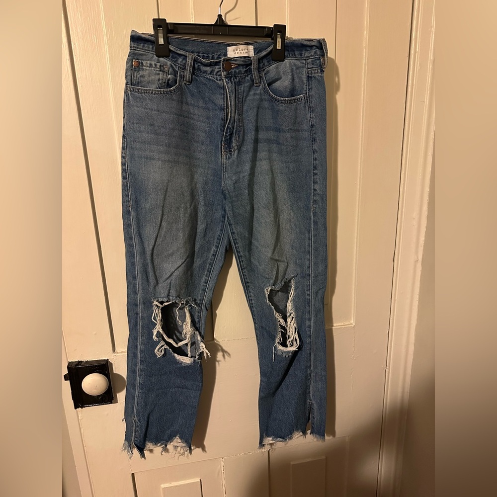 Straight legged ripped jeans